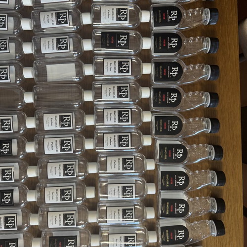 Plastic perfume bottles used, pack of 118, various sizes