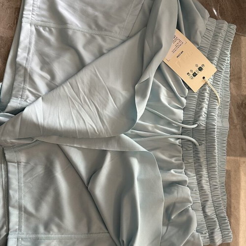 My Protein double sports shorts with inner pockets, turquoise, size M