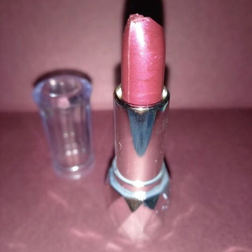 Purple lipstick shiny new with subtle glitter