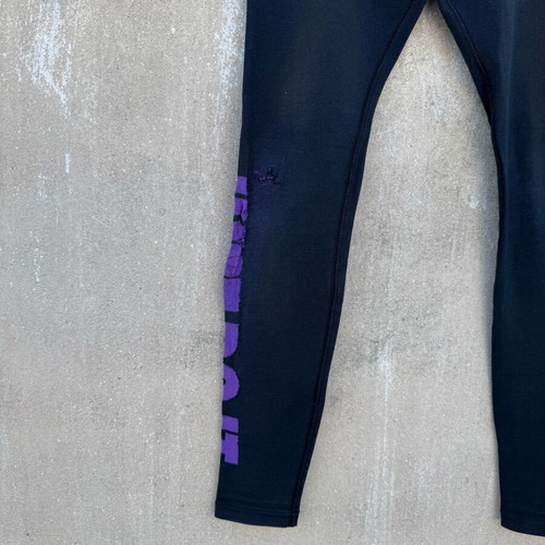 Nike legging used with knee defect, black and purple, size S