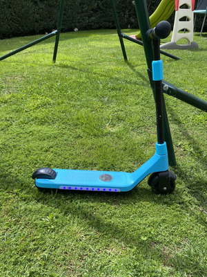 Electric children's scooter used with charger