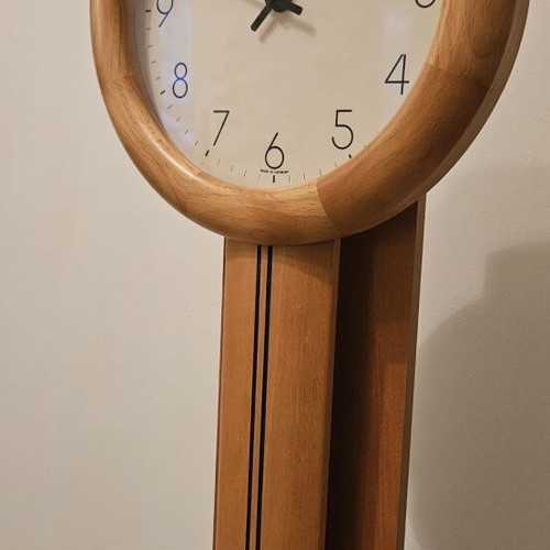 Hermle wall clock with pendulum like new, solid wood