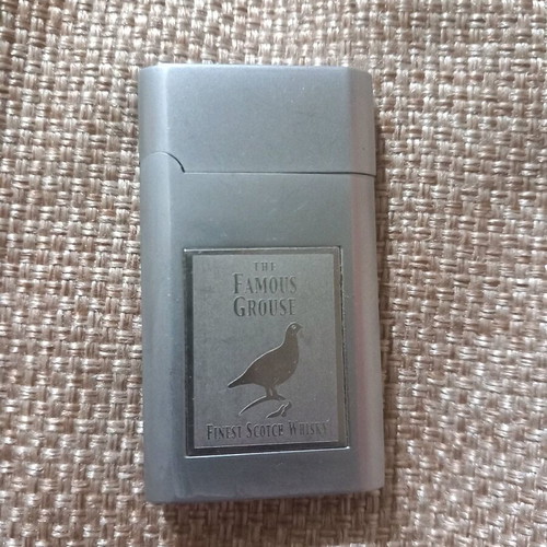 FAMOUS GROUSE collectible lighter used