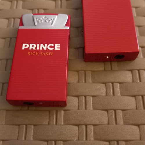 Prince lighters like new, set of 2 refillable with liquid