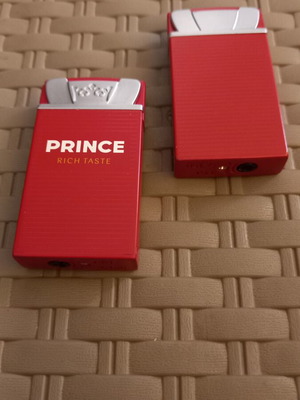 Prince lighters like new, set of 2 refillable with liquid