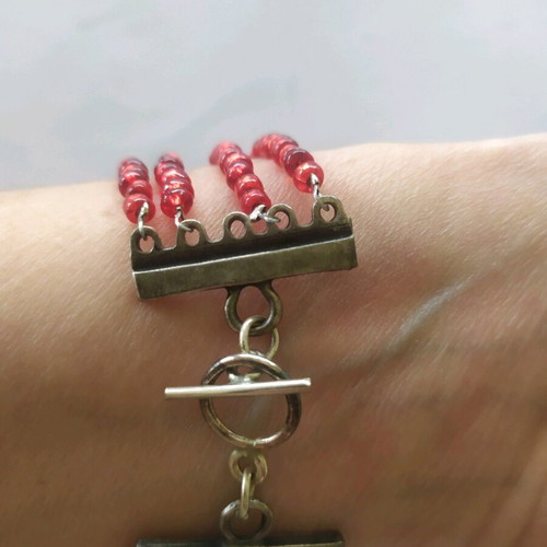 Handmade bracelet like new with red glass and vintage clasp