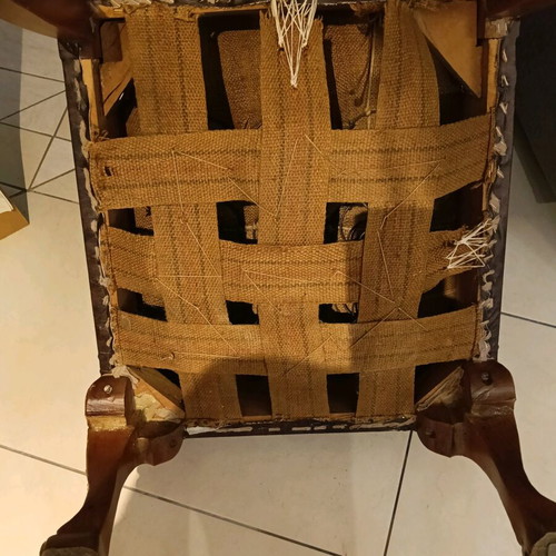 Set of two low chairs used with leatherette and wooden frame