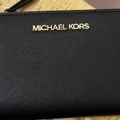 Michael Kors black wallet new with card slots and zipper coin pocket