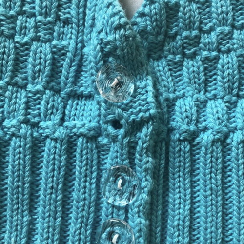 Knitted blue top used, missing one button