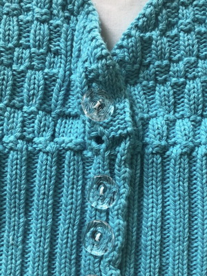 Knitted blue top used, missing one button