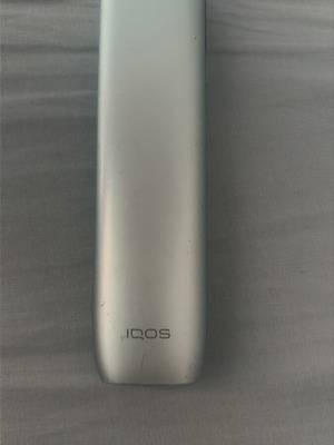 Iqos Iluma One device used, digital blue
