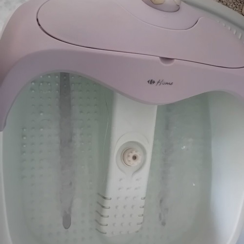 Foot Bath used with heating, bubbles, and massage functions