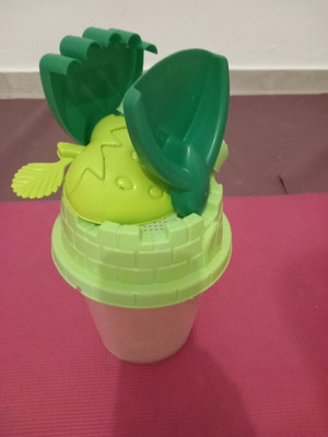 Children's beach bucket set used with shovel, rake and crocodile mold