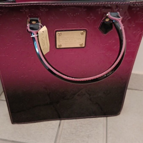 Bag multicolored like new with broken inner pocket zipper