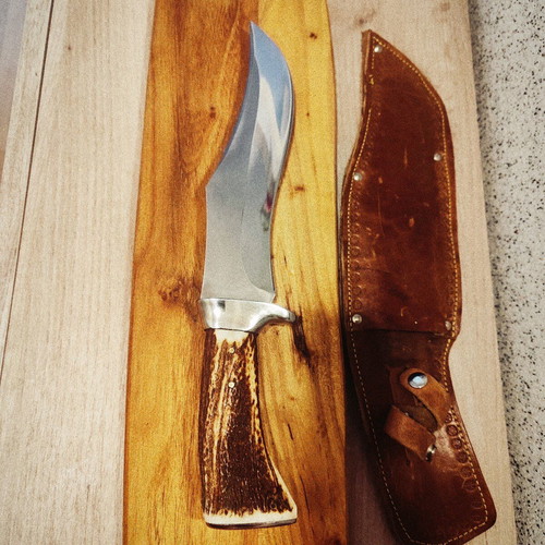 Massive hunting knife new from collection with elk horn handle and calf leather sheath
