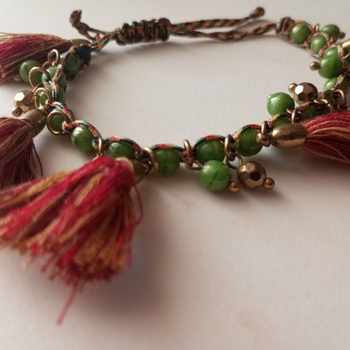 Bracelet new with green beads and red tassels boho style