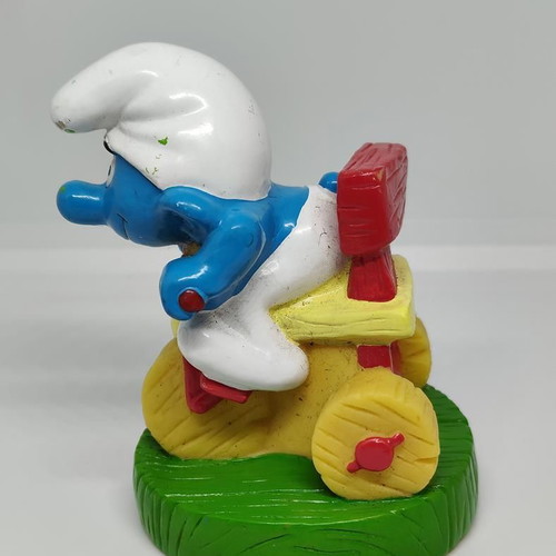 Smurf collectible figure on bicycle handmade Peyo like new