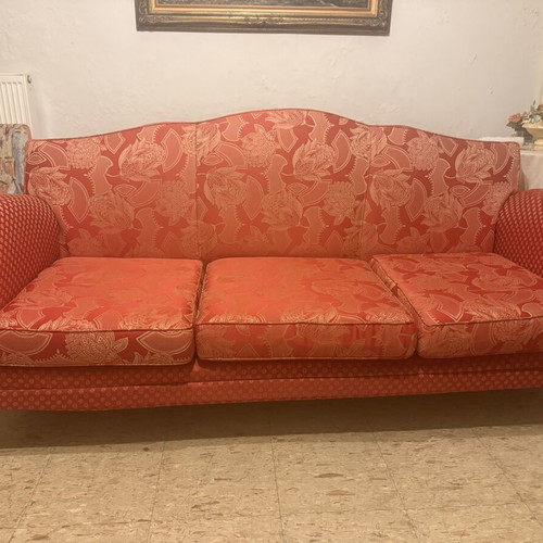 Vintage 1960s sofa with floral upholstery and carved wooden legs