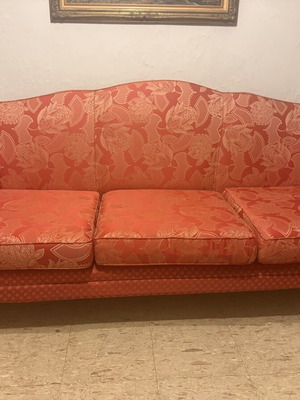 Vintage 1960s sofa with floral upholstery and carved wooden legs