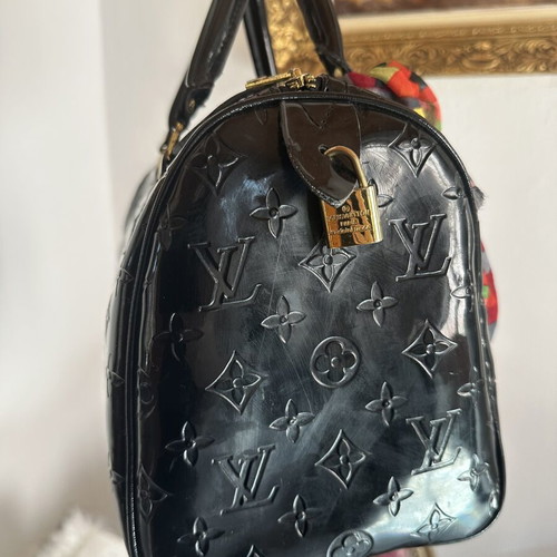 Louis Vuitton old black bag with gold accessories