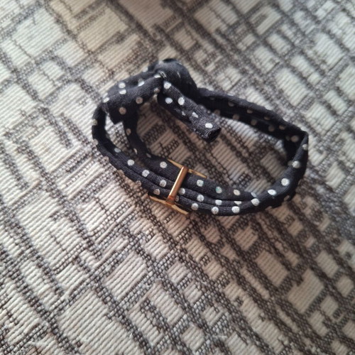 Fabric bracelet with eye pattern like new, black and grey