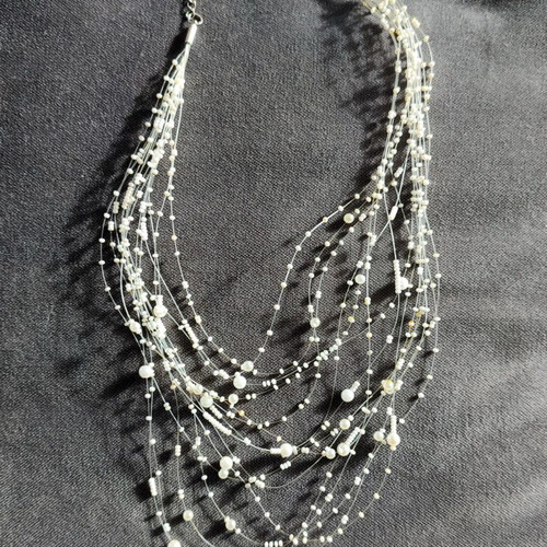 Accessorize white faux bijoux necklace used with white beads