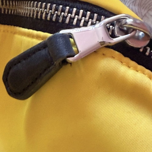 Versace backpack like new with leather details yellow