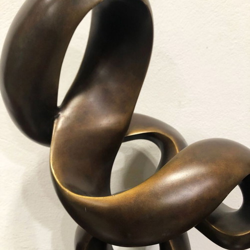 Modern sculpture used on black base, height 62cm