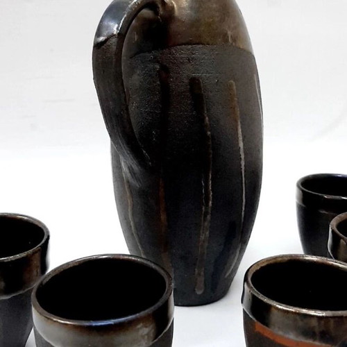 Vintage ceramic alcohol set with jug and 5 cups used
