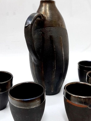Vintage ceramic alcohol set with jug and 5 cups used