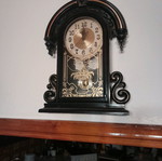 Antique wall clock hanging used