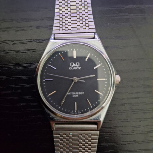 Q&Q Quartz men's watch used, silver with black dial