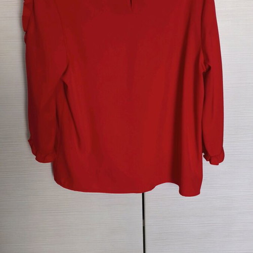 Women's red blouse with ruffles like new, size L