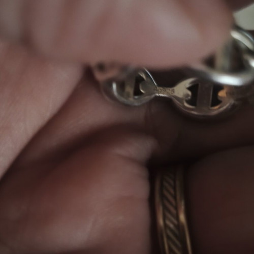Gold-plated ring with chain design, like new, silver color, size 58-60