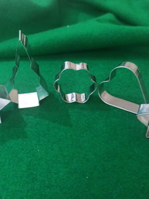Cookie cutters with Christmas designs used
