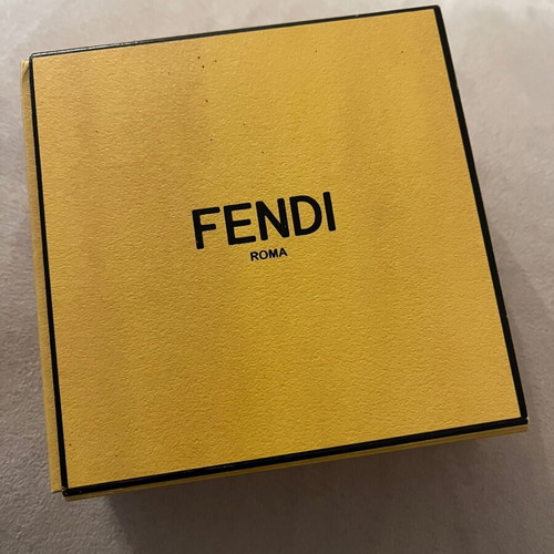 Fendi bag charm letter G with blue fur, like new