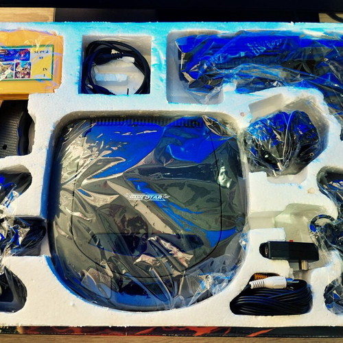Retro 32-bit game console like new with accessories