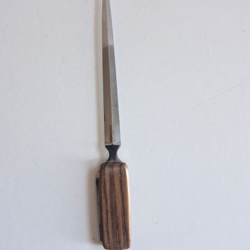 Paper cutter with built-in knife used