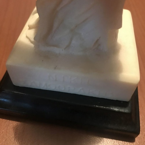 Nike of Samothrace alabaster figurine with minimal black base like new