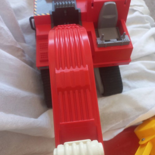 Toy vehicle set used with Playmobil excavator and Fischer Price carriage