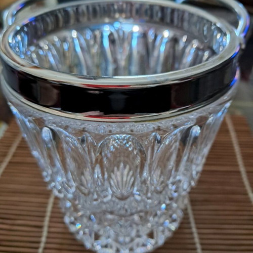 Vintage crystal ice bucket used with stainless steel rim and handle