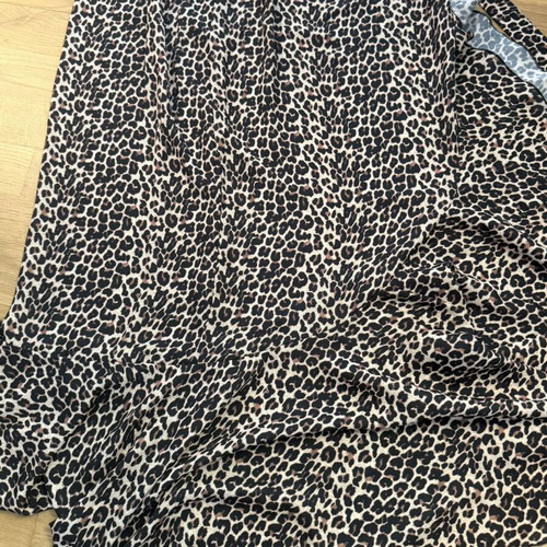 Wrap long skirt with ruffle hem and leopard print