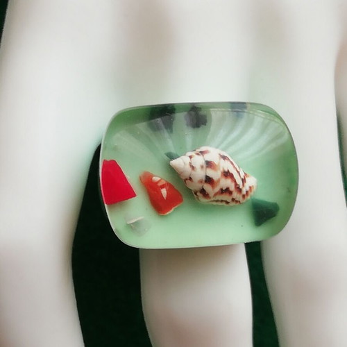 Blown glass ring with shell in transparent green color new