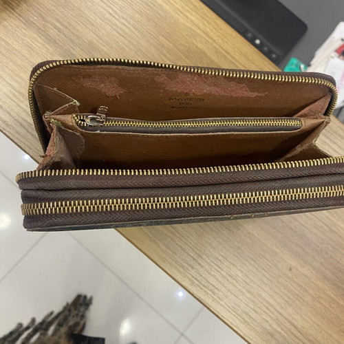 Louis Vuitton double zipper monogram wallet used, brown