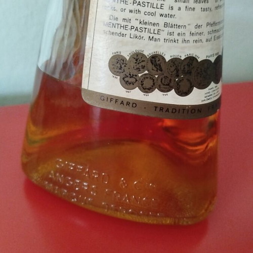 Giffard Menthe Pastille liqueur bottle used, triangular glass shape