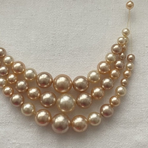 Elegant pearl necklace pink-gold, like new, 3 strands, 50 cm