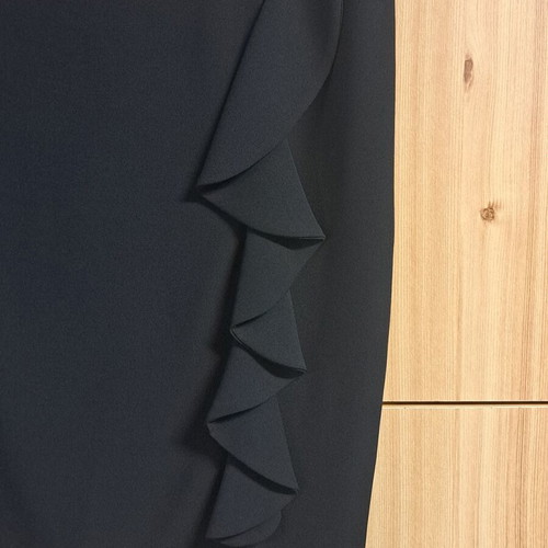 Black skirt with unique left-side design, like new, size XXL