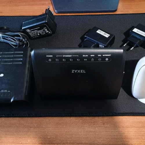 Three old routers, fully functional
