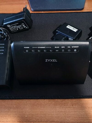 Three old routers, fully functional