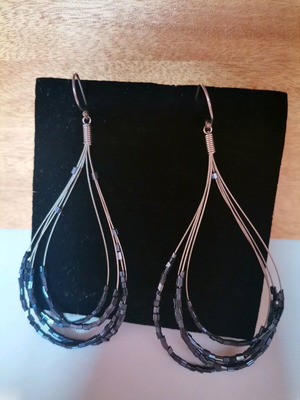 Handmade hanging earrings like new with black beads